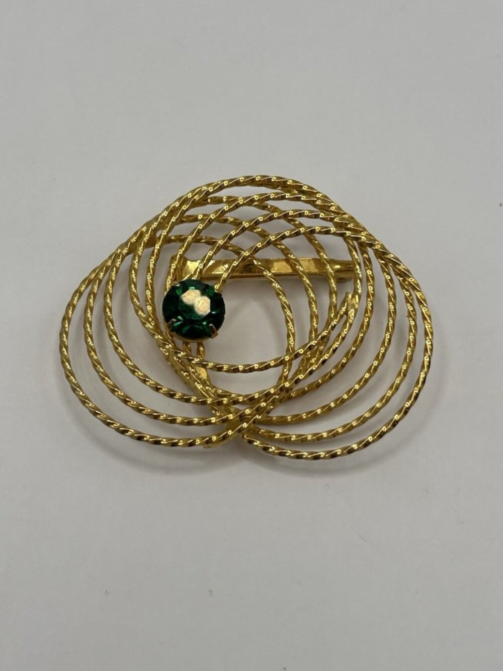 MCM Retro Brooch Gold Tone Spiral Circle Green Rhinestone Center Elegant Pin
